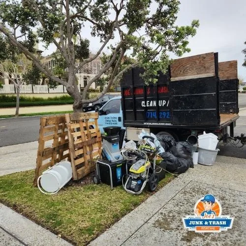 Joe's Junk and Trash Removal crew hauling junk in Orange County, CA
