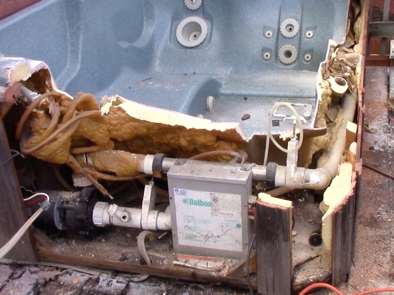 Jacuzzi removal in Orange, CA, disconnecting the pump and plumbing